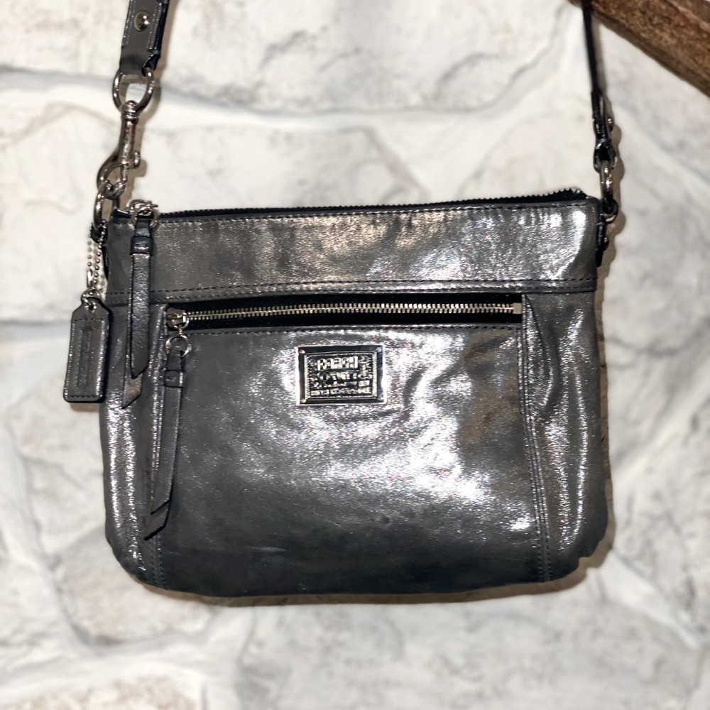 Coach crossbody silver purse.